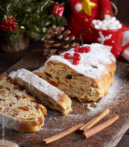 traditional European Stollen cake with nuts and candied fruit