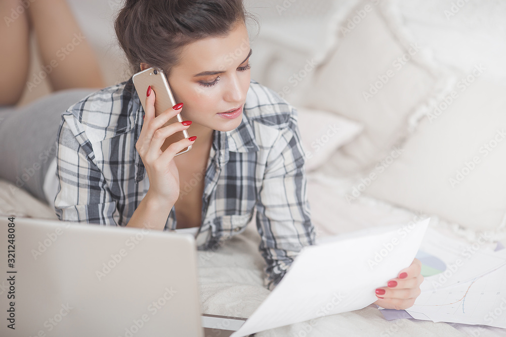 Young attractive woman working at laptop Young attractive woman working at laptop