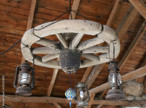 Old carriage wheel used as decoration in a house.Safranbolu
