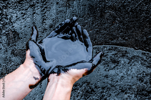 crude oil surface background textured. Pollution with oil products.