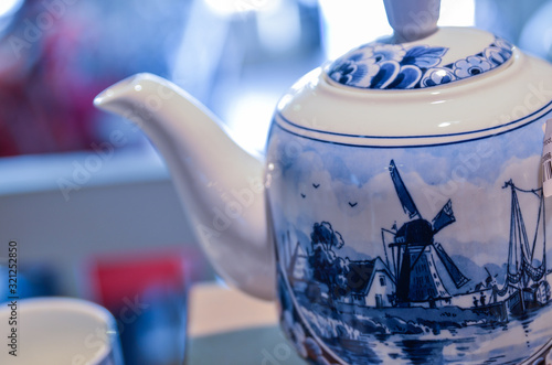 Delft, the netherlands, august 2019. At a shop of the famous white and blue ceramics. photo