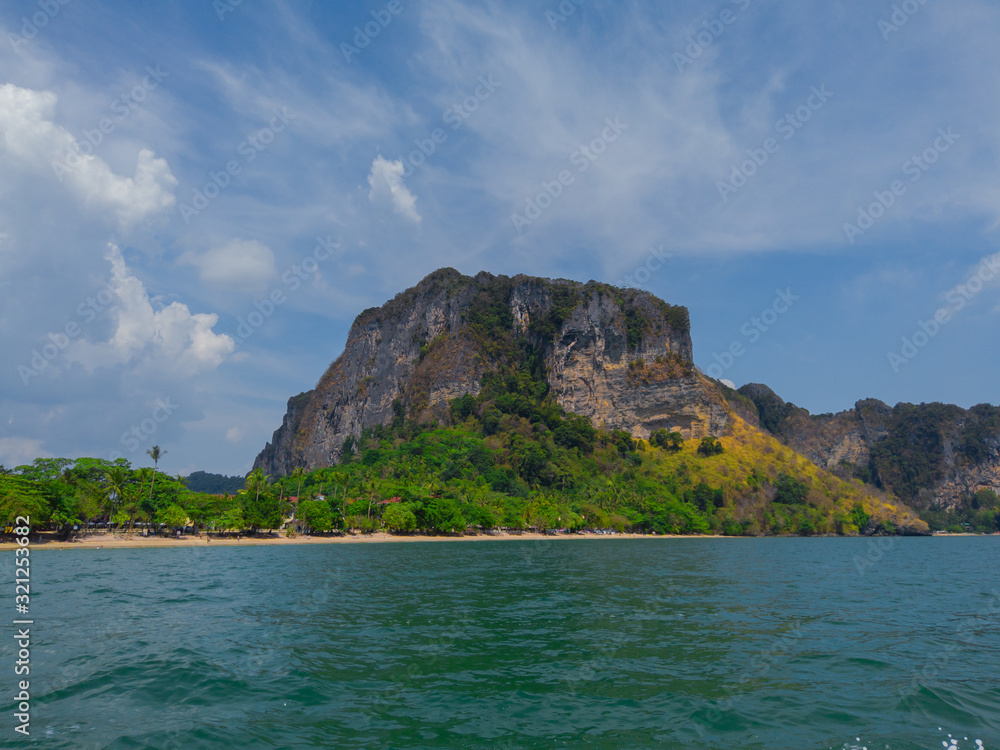 mountain and the blue belly as the background Ao Nang Beach, Krabi Thailand