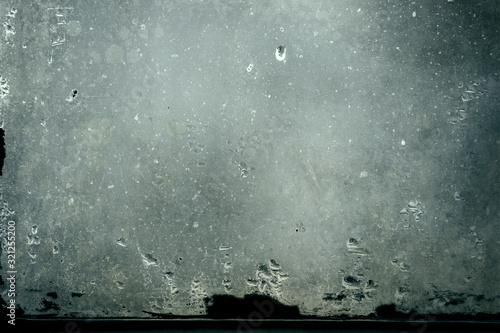 dirty glass with water vapor condensation drops  grunge background