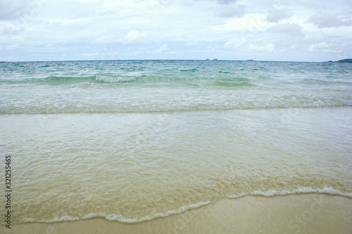 Fototapeta Naklejka Na Ścianę i Meble -  Vintage Soft Wave Of Blue Ocean On Sandy Beach