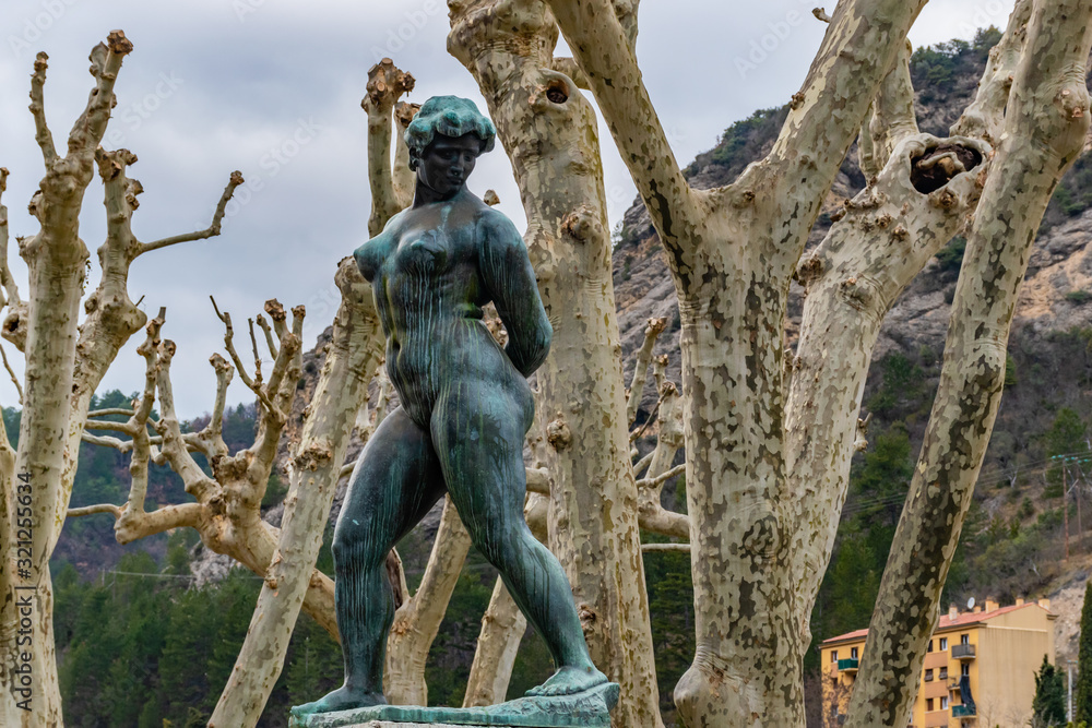 Fototapeta premium Puget-Theniers, France - January 23, 2020: Monument titled 'Enchained Liberty' ('la Liberté Enchaînée') by Aristide Maillol in tribute to Auguste Blanqui (1908)