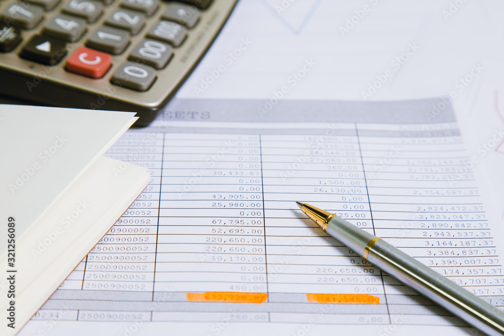 Spreadsheet bank accounts accounting with calculator.Concept for financial fraud investigation, audit and analysis. Spreadsheet bank accounts accounting with calculator.Concept for financial fraud investigation, audit and analysis.