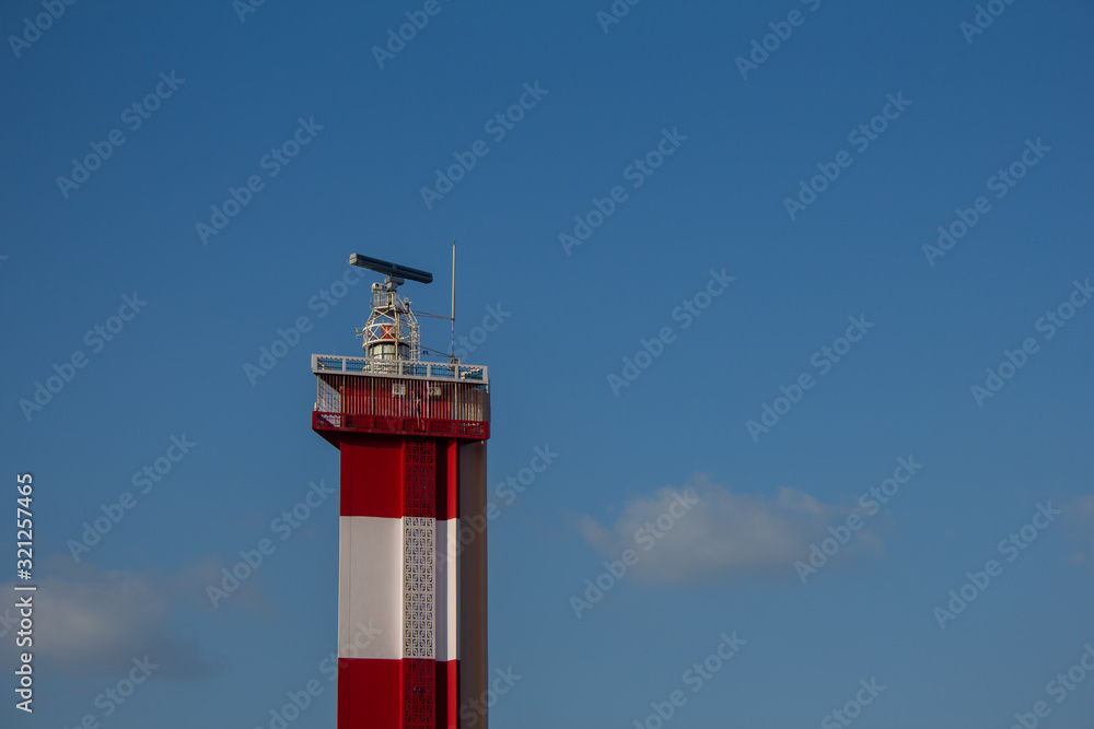 View of lighthouse near marina beach against blue sky background, Chennai, India