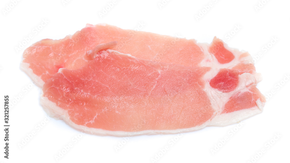 Raw pork meat with parsley herb leaves isolated on white background Raw pork meat with parsley herb leaves isolated on white background