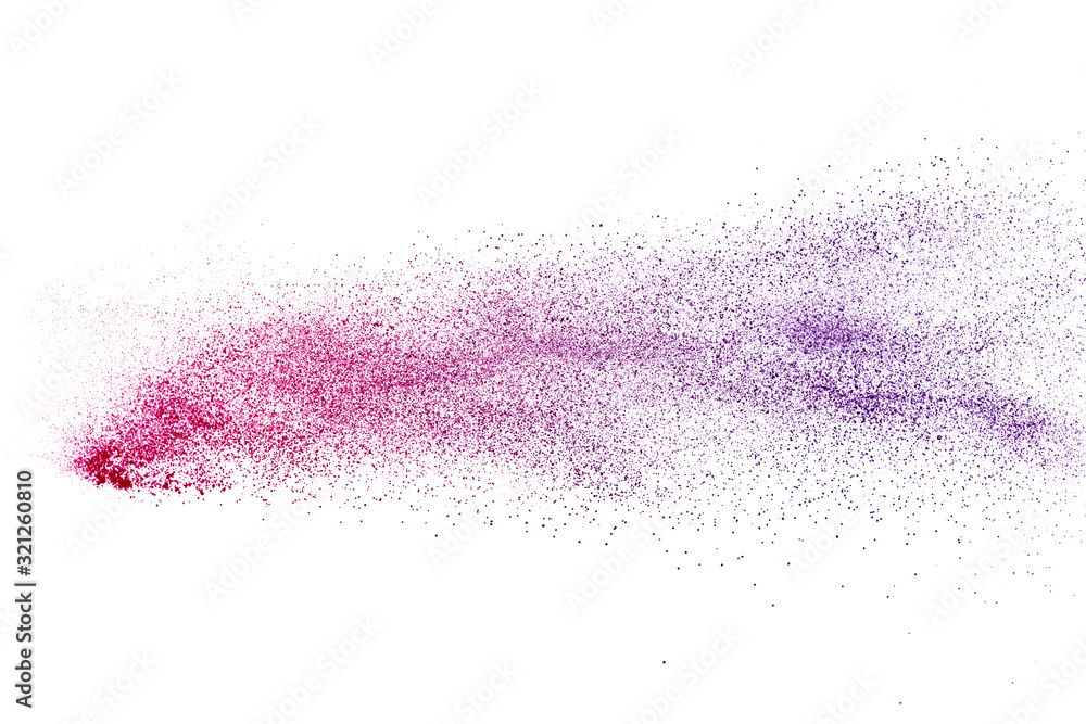 Freeze motion of purple color powder exploding on white background. Freeze motion of purple color powder exploding on white background.