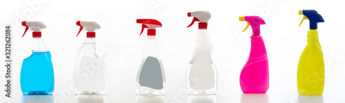 Cleaning spray bottles set isolated against white background.