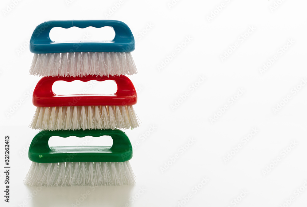 Cleaning brushes isolated against white background, copy space Cleaning brushes isolated against white background, copy space