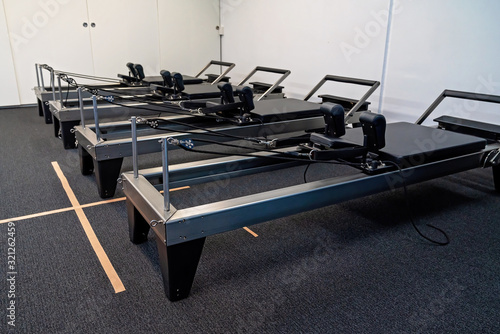 Row Of Pilates Reformers photo