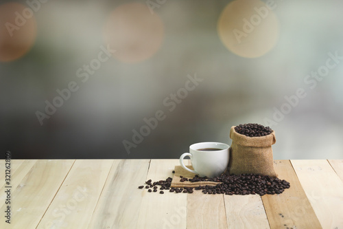 Hot Coffee cup on the wooden table