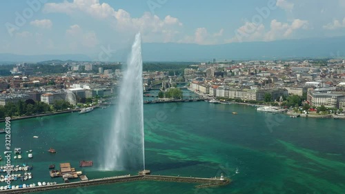flight over summer day geneva city lakeside bay fountain aerial panorama 4k switzerland