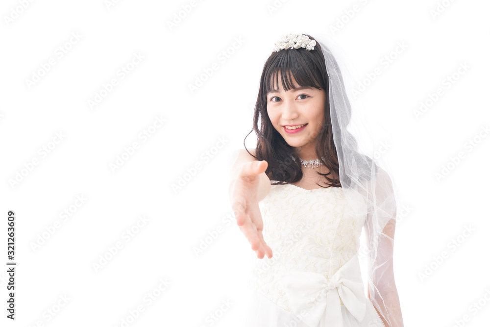 握手をするドレス姿の花嫁 握手をするドレス姿の花嫁