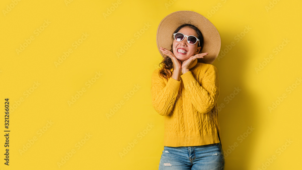 Image of beautiful cute young girls smiling and happy isolated over yellow background. space to copy the text Image of beautiful cute young girls smiling and happy isolated over yellow background. space to copy the text
