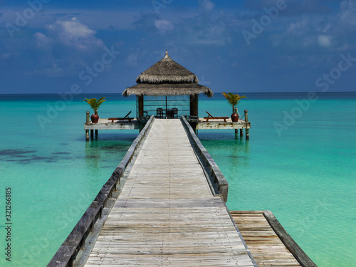 Footbridge into the sea - Kuramathi Maldives © Christian