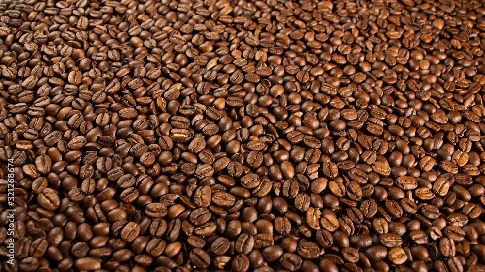Texture of coffee seeds, selective focus, close-up Texture of coffee seeds, selective focus, close-up