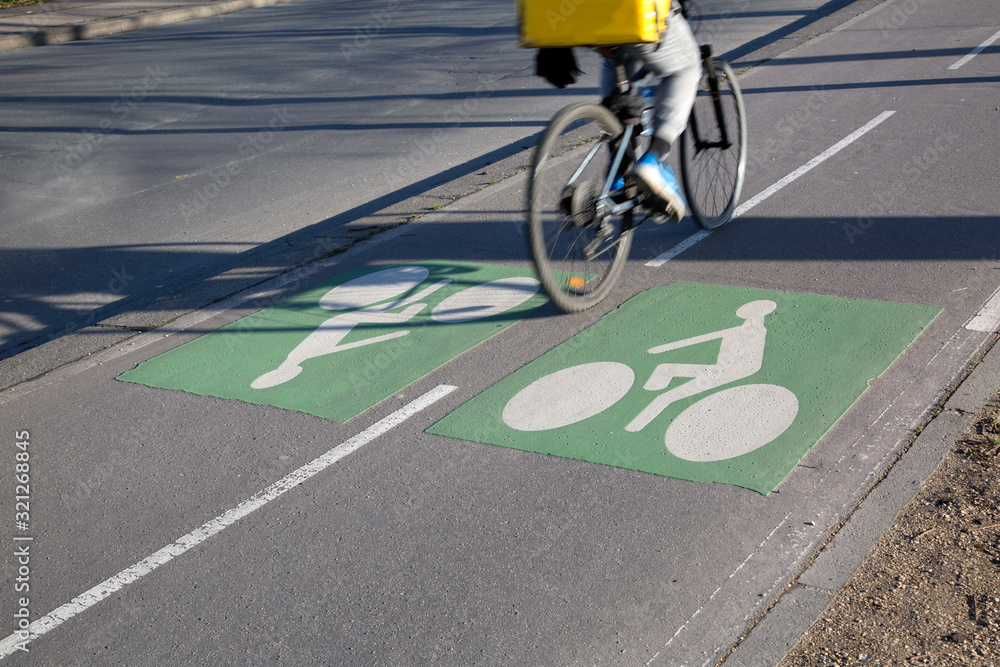 Cyclist on Bike Path in Paris