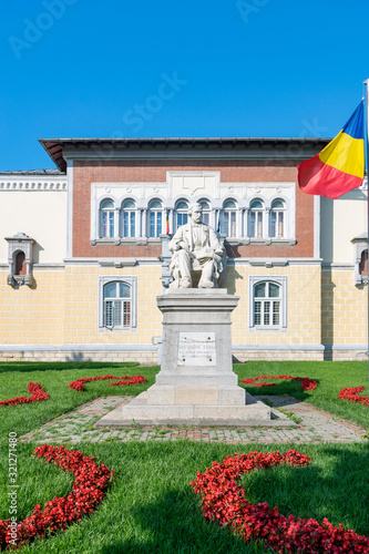 Gheorghe Asachi statue and Primary School Gheorghe Asachi in Iasi, Romania. He was one of the most influential people of his generation. Gheorghe Asachi statue in Iasi, Romania photo