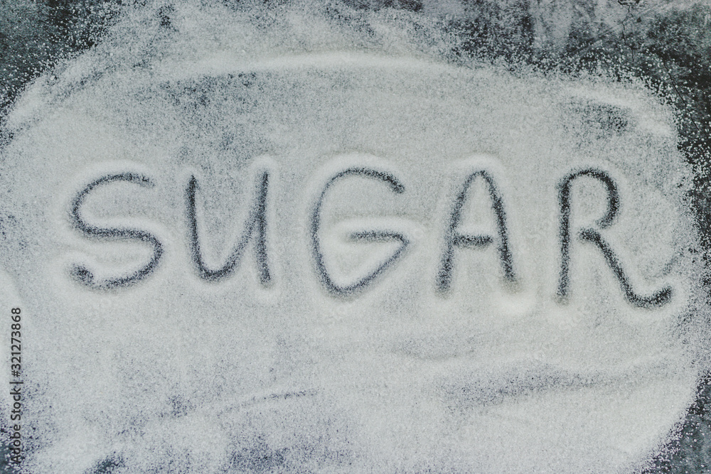 WHITE SUGAR WRITING ON THE TABLE WHITE SUGAR WRITING ON THE TABLE