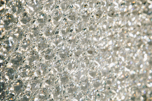 Beautiful shiny diamonds swarovski crystal background. Luxury, wealth. Cover pattern. Macro photo, close up of expensive stones. photo