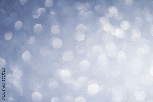 abstract blur white, blue  and silver color background with star glittering light photo
