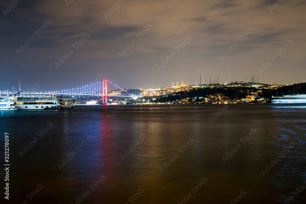 Bosporus in the night at istanbul. Bosphorus bridge and Camlica big mosque