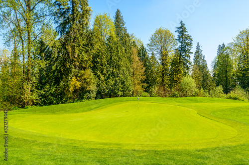 Gorgeous green at the beautiful golf course.
