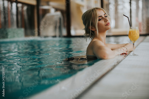 Pretty young blonde woman r...