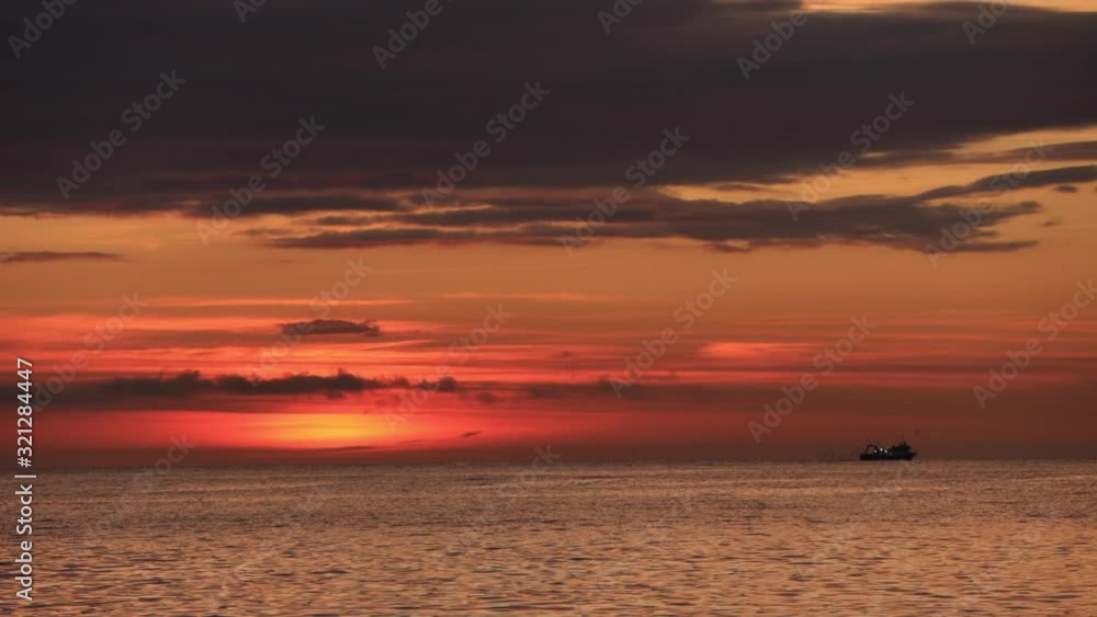Sunrise over the beach of Barceloneta in Barcelona, Spain Sunrise over the beach of Barceloneta in Barcelona, Spain