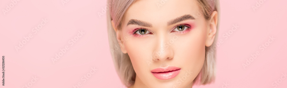 panoramic shot of attractive tender girl with pink makeup, isolated on pink panoramic shot of attractive tender girl with pink makeup, isolated on pink
