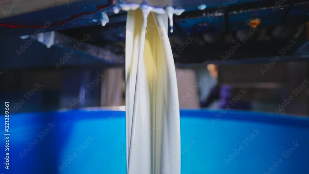 Paint mixing, paint mixing process, factory color. Pouring (pouring