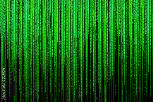 Imitation of a binary code in the form of a matrix. Green binary code flowing down from top to bottom  isolated on black background.