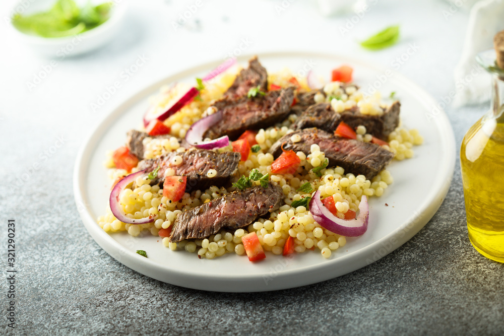 Beef steak salad with pasta and vegetables Beef steak salad with pasta and vegetables