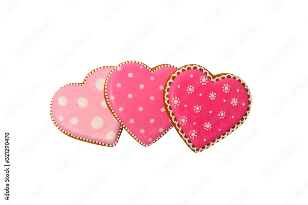 background from pink cookies heart shaped with different patterns, isolated background from pink cookies heart shaped with different patterns, isolated