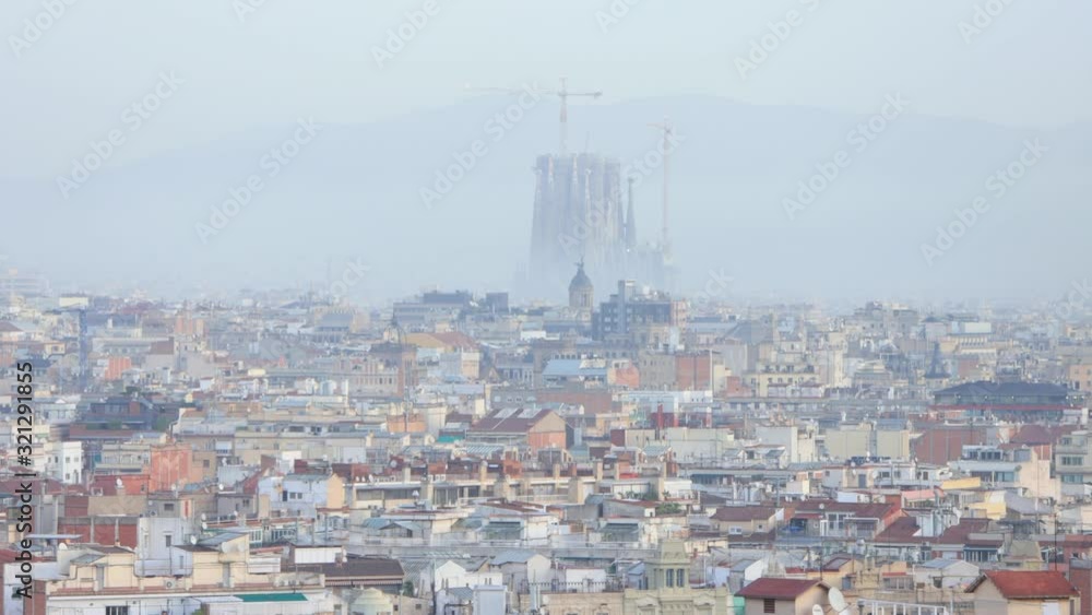 The Sagrada Familia and skyline of Barcelona, Spain at sunrise The Sagrada Familia and skyline of Barcelona, Spain at sunrise
