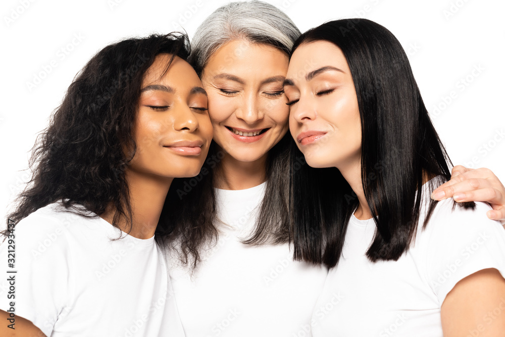 cheerful multicultural women with closed eyes isolated on white cheerful multicultural women with closed eyes isolated on white