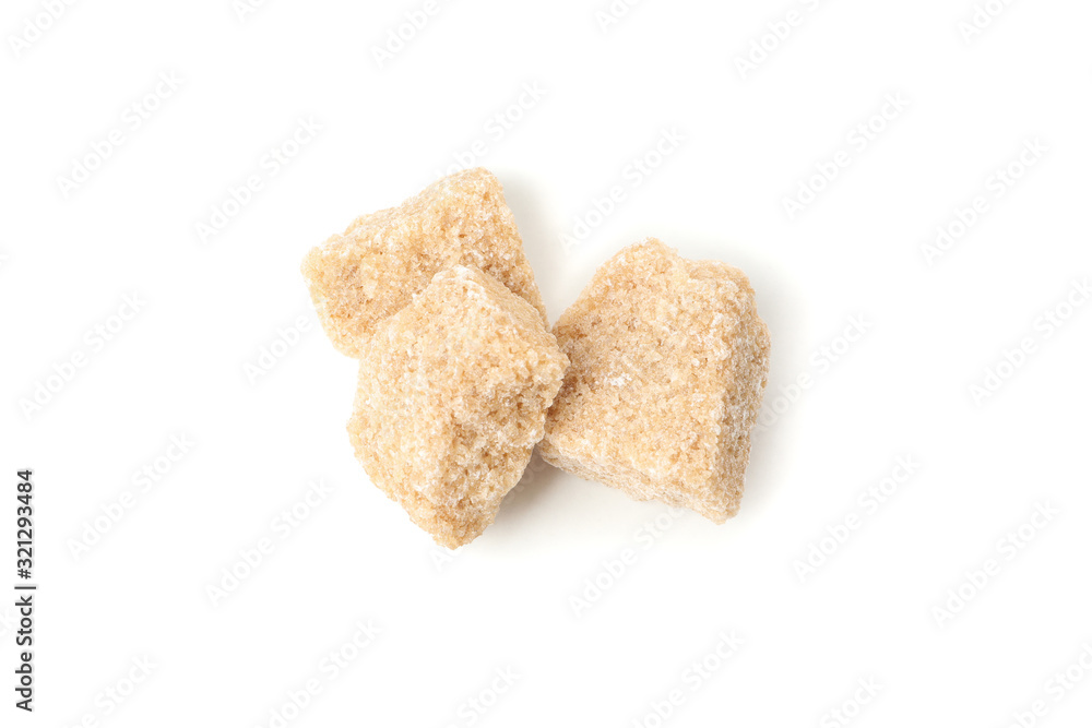 Brown sugar slices isolated on white background, close up Brown sugar slices isolated on white background, close up