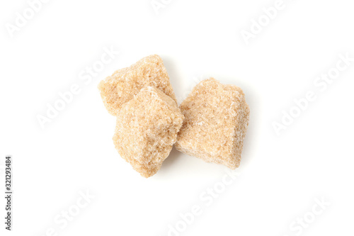 Brown sugar slices isolated on white background, close up