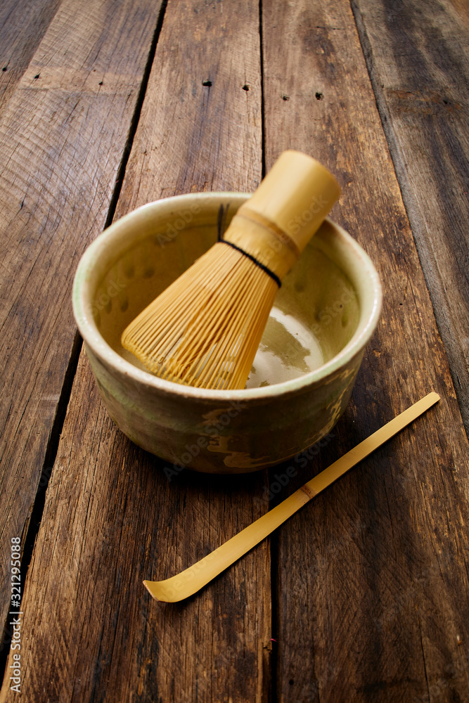Japanese maccha green tea on wood plank Japanese maccha green tea on wood plank