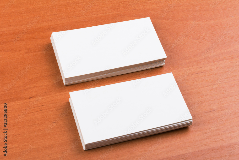 white blank business cards on wooden background.close-up white blank business cards on wooden background.close-up