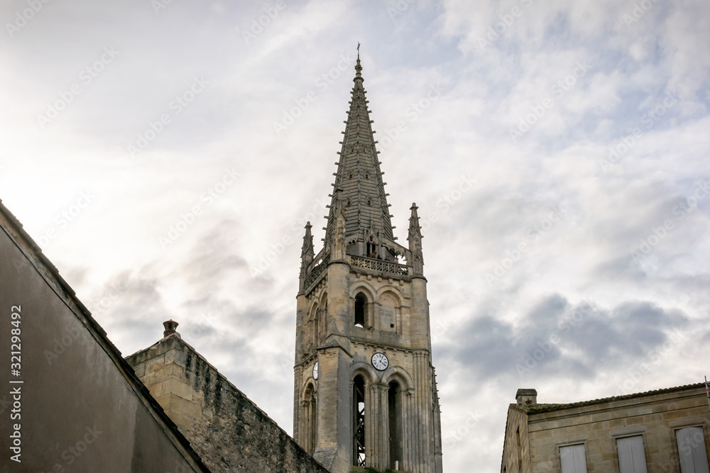 Bell tower of the church Monolith de Saint Emilion. Medieval architecture. Aquitaine, France, Europe Bell tower of the church Monolith de Saint Emilion. Medieval architecture. Aquitaine, France, Europe