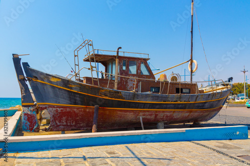 Ayia Napa  Cyprus - September 06  2019  An old fishing boat stands on the shore.