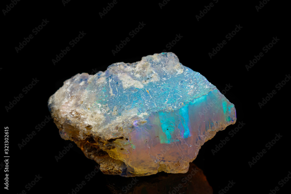 macro mineral stone rare and beautiful opals on a black background macro mineral stone rare and beautiful opals on a black background