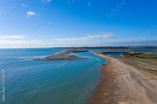 Pagham Beach sweeping bay with the entrance to Pagham Harbour. © Geoff
