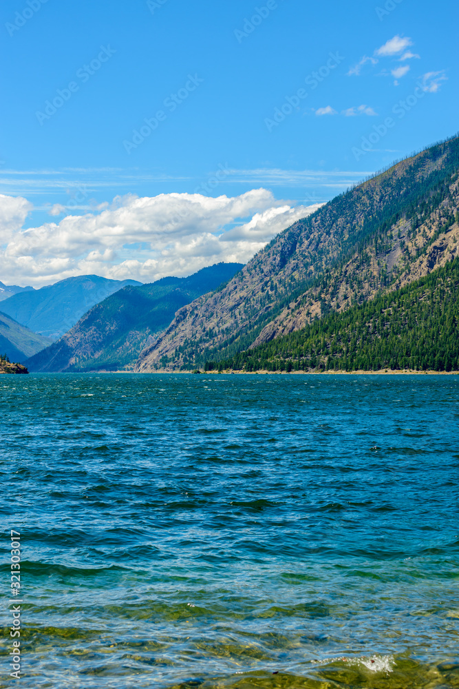 Fototapeta premium Mountain landscape with blue Seton Lake in Coastal Mountains. Lillooet, British Columbia, Canada.