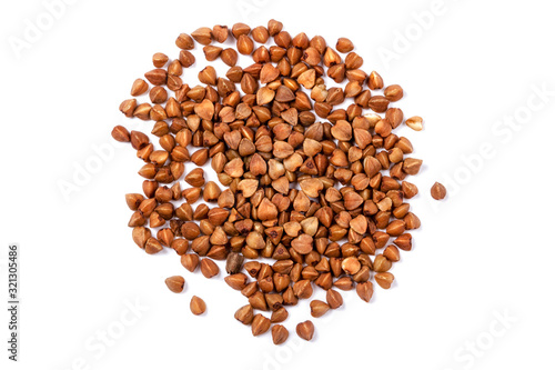 Close up of buckwheat grains isolated on white background