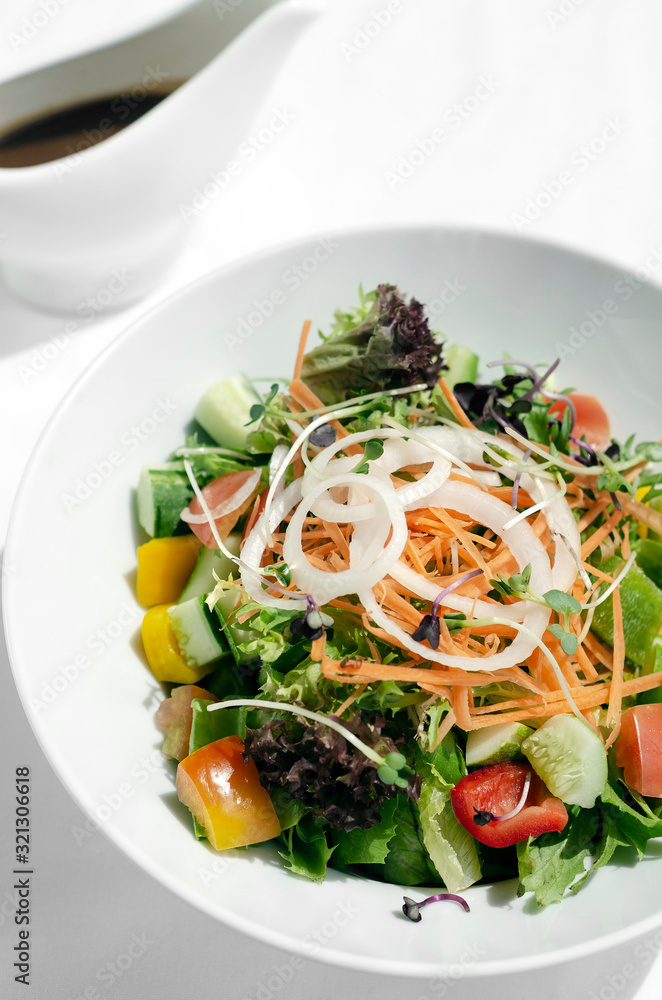 fresh organic mixed vegetable vegan Garden Salad with Vinaigrette sauce