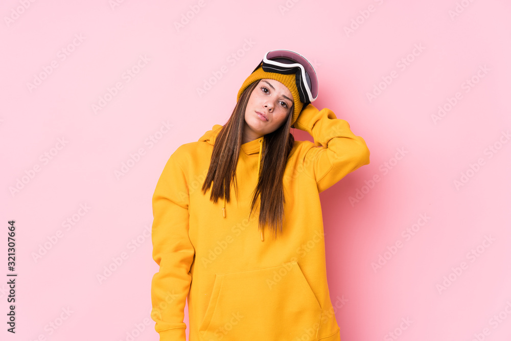 Young caucasian skier woman isolated being shocked, she has remembered important meeting. Young caucasian skier woman isolated being shocked, she has remembered important meeting.